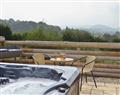 Relax in a Hot Tub at Cwm Yr Hendy Lodges - Oak View; Powys