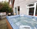 Relax in your Hot Tub with a glass of wine at Dartmoor Valley Lodge; ; Honicombe Manor near Gunnislake