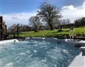 Relax in your Hot Tub with a glass of wine at Deer lodge at Chapel Lodges; ; Wimborne Minster