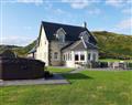 Relax in your Hot Tub with a glass of wine at Degnish Farmhouse; Argyll