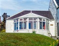 Enjoy a glass of wine at Dunrigh Cottage; Isle Of Arran