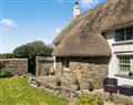 Enjoy a glass of wine at East Titchberry Cottage; Devon
