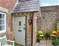 Enjoy a glass of wine at Eves Cottage; West Sussex