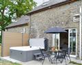 Relax in your Hot Tub with a glass of wine at Ffynnongrech Farm Cottages - Towy Cottage; Dyfed