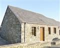 Relax in your Hot Tub with a glass of wine at Fynnonmeredydd Cottages - Tan Y Dderwen; Dyfed