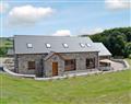 Lay in a Hot Tub at Fynnonmeredydd Cottages - The Stable; Ceredigion