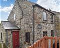 Enjoy a glass of wine at Gable End Cottage; North Yorkshire
