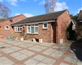 Enjoy a glass of wine at Garden Cottage; ; Surlingham near Poringland