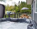 Relax in your Hot Tub with a glass of wine at Georgies Den; Dyfed