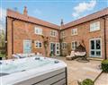 Relax in a Hot Tub at Gilbertson Cottage; North Yorkshire