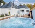 Relax in your Hot Tub with a glass of wine at Glencoe House Lodges - Strathcona Classic Lodge; Argyll