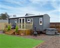 Relax in your Hot Tub with a glass of wine at Glenskinno - The Shepherds Hut; Angus