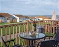 Take things easy at Golden Bay Holiday Village - Beach Cottage 24; Devon