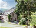 Lay in a Hot Tub at Graig Las Holiday Cottages- The Barn; Powys