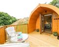 Enjoy a glass of wine at Grassholme Glamping Pod; ; Bowbank near Middleton-In-Teesdale