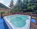 Relax in a Hot Tub at Great Glen Waterside Cottages - Struan Cottage; Inverness-Shire