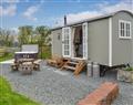 Relax in your Hot Tub with a glass of wine at Greengill - Greengill Farm Shepherds Hut; Cumbria