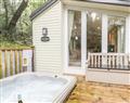 Relax in your Hot Tub with a glass of wine at H66B Aberdunant; ; Prenteg near Porthmadog