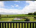 Enjoy a glass of wine at Hawthorn at Moorhead Country Holidays; ; Moorhead Farm near Woolfardisworthy