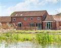 Helsey Farm Holiday Cottages - The Corn Store in Lincolnshire