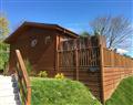 Relax in your Hot Tub with a glass of wine at Hideaway Lodge; ; Tintagel