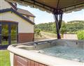Enjoy your time in a Hot Tub at Hill View Lodge; Powys