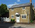 Enjoy a glass of wine at Hollytree Cottage; ; Hook Norton