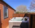 Enjoy your time in a Hot Tub at Honeysuckle Lodge; ; Runswick Bay near Staithes