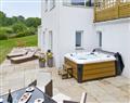 Lay in a Hot Tub at Horselake Farm Cottages - Sundance; Devon