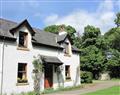 Enjoy a glass of wine at Keepers Cottage; Ross-Shire