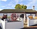 Enjoy a glass of wine at Kimberley Bungalow; Ross-Shire