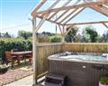 Relax in your Hot Tub with a glass of wine at Kinvara; Wigtownshire