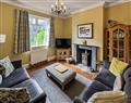 Enjoy a glass of wine at Lancashire and Yorkshire Cottage; North Yorkshire