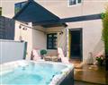 Relax in your Hot Tub with a glass of wine at Lemon Cottage; Devon
