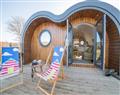 Relax in your Hot Tub with a glass of wine at Lets Glamp Retro -  Lets Glamp Retro Queen; Dyfed