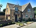 Enjoy a glass of wine at Lime Cottage; Longborough; Stow On The Wold