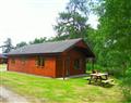 Enjoy a glass of wine at Lochletter Lodges - Plodda Lodge at Lochletter Lodges; Inverness-Shire