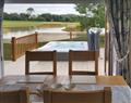 Relax in your Hot Tub with a glass of wine at Low Farm - 2 Misty Meadows; Lincolnshire