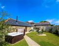 Enjoy your time in a Hot Tub at Manor Fletching; Cornwall
