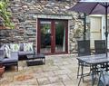 Enjoy a glass of wine at May Cottage; Cumbria