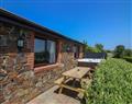 Relax in your Hot Tub with a glass of wine at Mermaid Cottage; Cornwall