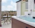 Relax in your Hot Tub with a glass of wine at Mid Bishopton Farm Cottages - Mid Bishopton Cottage; Wigtownshire