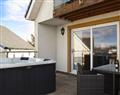 Relax in your Hot Tub with a glass of wine at Military Drive - 8 Military Drive; Wigtownshire