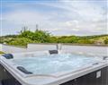 Relax in your Hot Tub with a glass of wine at Military Drive - No 7 Military Drive; Wigtownshire