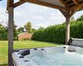 Enjoy your time in a Hot Tub at Mill Farm Holiday Cottages - River Cottage; Powys