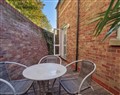 Enjoy a glass of wine at Minsters Reach Apartment One; York; North Yorkshire