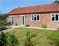 Enjoy a glass of wine at Moat Farm Cottage; Wood Dalling; Norfolk