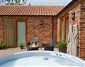 Relax in your Hot Tub with a glass of wine at Nesting Box; Lincolnshire