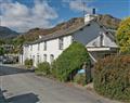Enjoy a glass of wine at Newfield Cottage; Cumbria