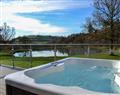 Relax in your Hot Tub with a glass of wine at Oak Park Lodges - Oak Park 1; Devon